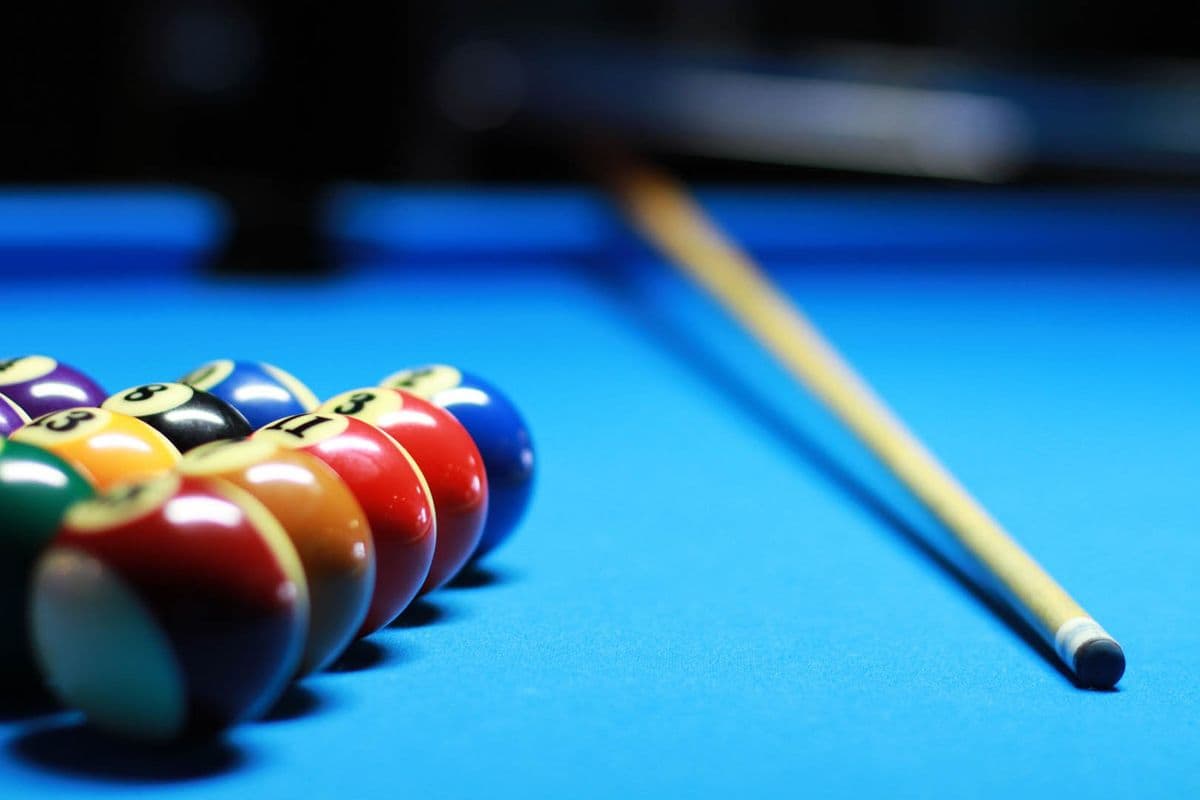 Pool table with a racked set of billiard balls
